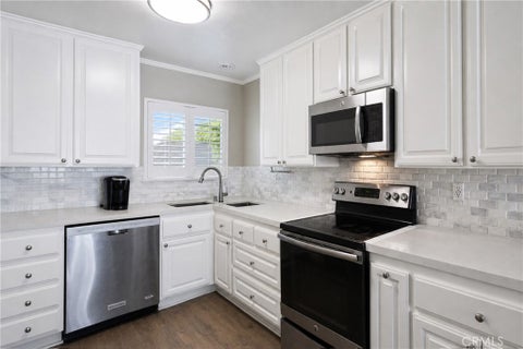Photo of 21946 Lakeland AVE, Lake Forest, CA 92630 (MLS # PW26155398)