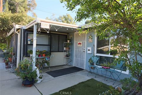 Photo of 19208 Avenue Of The Oaks #J, Newhall, CA 91321 (MLS # SR26048340)