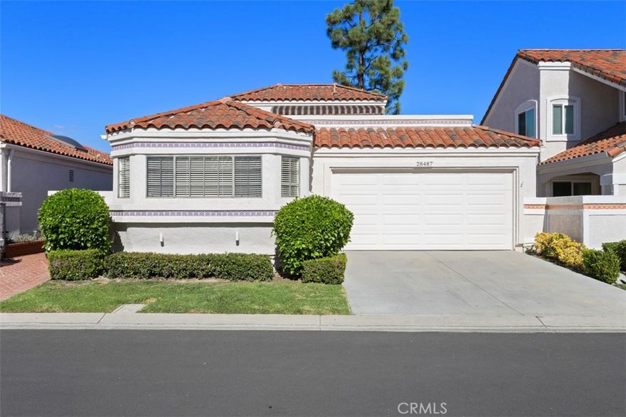 *55+ Community* Welcome to your next chapter of fun, freedom and relaxation in the heart of Casta del Sol, one of Orange County’s most sought-after 55+ communities! This charming 3-bedroom, 3-bathroom detached home is perfectly nestled on a quiet cul-de-sac and offers the ideal blend of comfort, style and community. Step inside and fall in love with the gorgeous brand-new light-colored wood-look tile flooring throughout and abundant natural light that creates a spacious, airy ambiance. The formal dining room features an updated modern light fixture and flows effortlessly into a sun-filled kitchen with direct access to the two-car garage. The primary suite is your private retreat with sliding glass doors that open to a wrap around covered patio with sweeping views perfect for morning coffee or unwinding in the afternoon. Enjoy a large ensuite bathroom with all the comforts you’d expect. The second bedroom offers a double-door entry, while a full bathroom is conveniently located just across the hall. Relax in the welcoming living room with vaulted ceilings, a cozy fireplace, and a warm, inviting atmosphere that truly feels like home. Upstairs, a versatile loft-style third bedroom and third full bath add flexibility for guests, hobbies or a home office. From the loft you have access to your sizable private deck which is the perfect spot to take in breathtaking sunsets. As a resident of this home, you can enjoy Lake Mission Viejo membership and have full access to two beautifully maintained recreation centers featuring pools, spas, tennis courts, pickleball courts, a gym, shuffleboard pavilion, billiards room, lawn bowling green, gardens and so much more. Love to golf? Swing by the Oso Creek Golf Course which is an 18-hole public course located just outside Gate 1. Start your year long vacation of resort living now in this beautiful South Orange County abode.