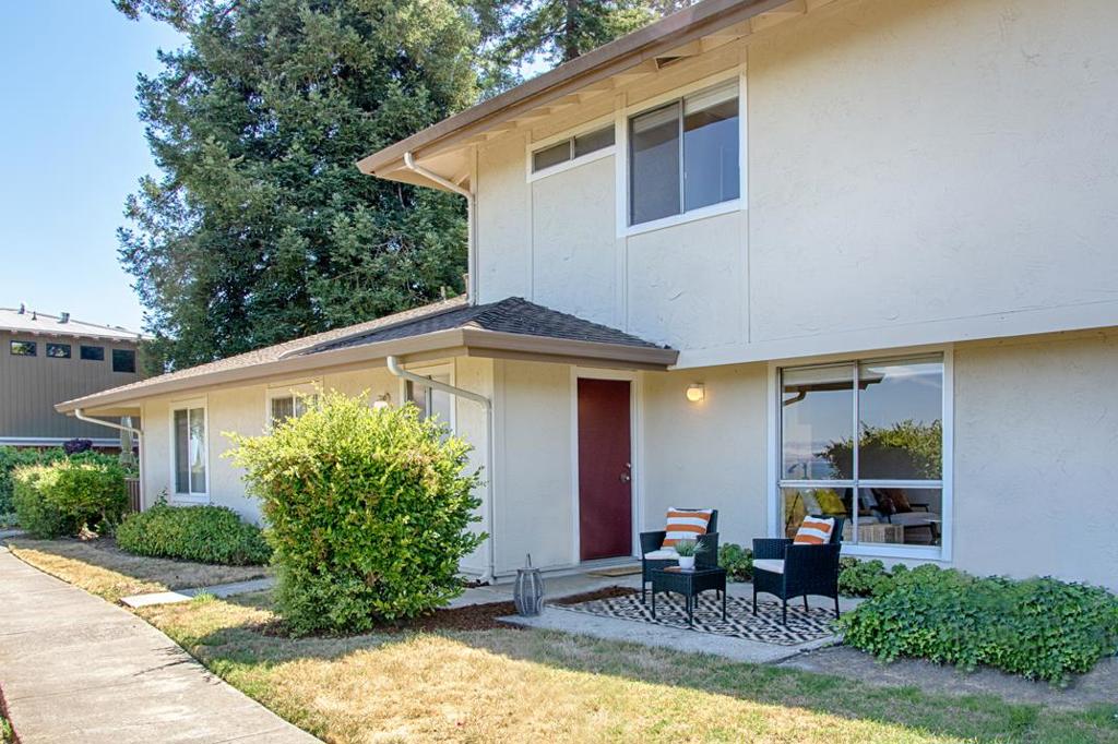 Ocean view for under $1 Million?? Here is your opportunity to own one of these rarely available upper Westside Ocean view townhomes. Located close to UCSC with a strong rental history but would be ideal for anyone who recognizes how special a unit like this can be. The spacious floorplan allows for ample room to relax and enjoy the view, work from home or entertain your family and friends. Flooring has been upgraded with wood laminate, new interior paint including the kitchen cabinets, new light fixtures, new kitchen appliances, pantry, washer and dryer, two patios with storage closet and easy access to the adjacent assigned carport space from the second entry door. Area Schools Include UC Santa Cruz, Santa Cruz High School, Mission Hill Junior High School and West Lake Elementary. Convenient to University Terrace Park and Dog Park, Westlake Park and Historic Pogonip with 640 acres of hiking trails. Just down the hill are grocery stores, amazing restaurants, wine tasting and so much more. Historic downtown Santa Cruz, the Beach Boardwalk and Municipal Wharf are all only minutes away by car or bike as well.