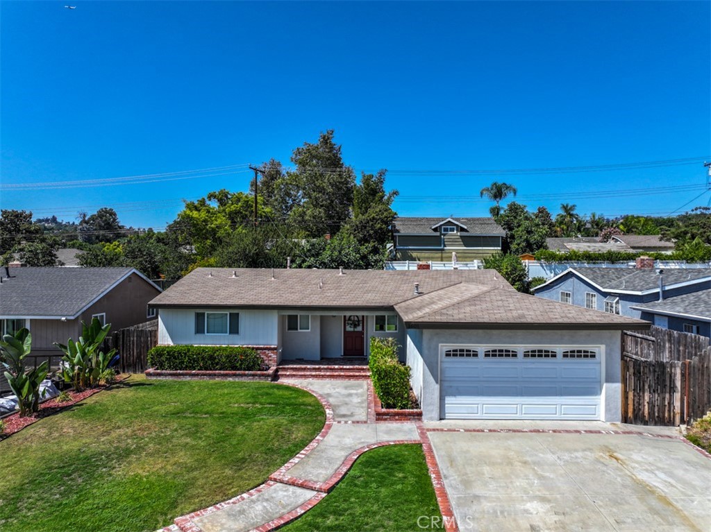 Welcome to 1601 Sansinena Ln, a 3 bedroom, 2 bath single story home in a sought-after area of La Habra, sitting just at the foothills of La Habra Heights. This Home has a Modern Open Floor Plan with a beautiful contemporary Remodeled Kitchen, new stainless steel gas stove and convection oven with elegant back splash tiles from Spain. Feel the warmth as you sit and enjoy this inviting kitchen. Dine at the island counter or in the dining room overlooking the living/family room with a gorgeous natural stone-designed gas fireplace while feeling the cool air looking out at the serene view of the big backyard. The large, covered patio has been meticulously designed with thoughts of entertaining family gatherings and those backyard BBQs get together with friends and family. The home has been newly painted inside and ready for its new owner. There is wood flooring throughout the dining room, family/living room. Both bathrooms have been Remodeled and Upgraded with elegant travertine stones and modern fixtures. Outside the whole home has fresh paint as well. The Electrical Panel has been updated. Light Fixtures upgraded throughout. There are 3 Ceiling Fans, 1 inside and 2 outside in the beautiful, covered patio. The exterior lawn areas, front yard, back yard and planters in the back all run on a watering Sprinkler System. Did we mention the backyard is super spacious with lots of room for the little ones and pets to run around and play in? And the clean 2 Car Garage with direct access to the home is convenient for direct entry. This home is only minutes from Award Winning public and private elementary schools and is in the Fullerton Joint Union High School District. It's within walking distance to the popular Osornio Sports Park, near other recreational parks, shopping centers, grocery stores, restaurants and more! This home won’t last so don’t miss your chance!