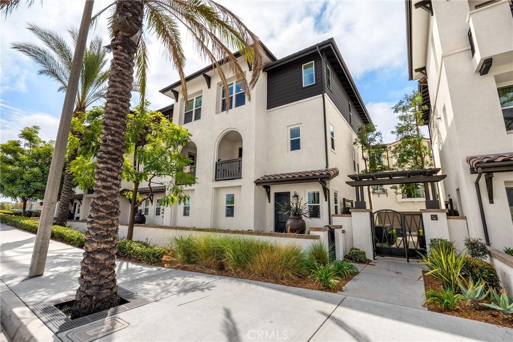 Modern Comfort Meets Smart Living in Buena Park! Welcome to 8252 Orangethorpe Ave — a beautiful tri-level end-unit townhome offering 3 spacious bedrooms, 2.5 baths, and a 3-car garage- a versatile space perfect for a home gym, storage, or office. Built in 2016 with a clean, transitional style, this move-in-ready home combines modern finishes with smart functionality — all at a price below recent neighborhood sales.
Step inside to discover a bright, open-concept layout with gorgeous hand scraped wood flooring throughout, LED recessed lighting, ceiling fans in all the bedrooms, and dual-paned windows that ensure peace and quiet from the outside world. The kitchen is a chef's dream with sleek cabinetry, stainless appliances, and a smart refrigerator that keeps tabs on your grocery list for you. Enjoy your morning coffee or evening wine on the private balcony, or entertain guests at the community BBQ lounge area with outdoor fireplace — all included with a low monthly HOA. Additional value-adds include a whole-house carbon water filtration system, washer and dryer, oversized walk-in closet in the primary suite, central A/C and energy-efficient systems. Located just minutes from shopping, dining, and entertainment, including The Source, Knott's Berry Farm, and Buena Park Downtown this home puts you close to everything — with freeway access, parks, and top conveniences all nearby. This is truly THE BEST VALUE IN ALL OF BUENA PARK!