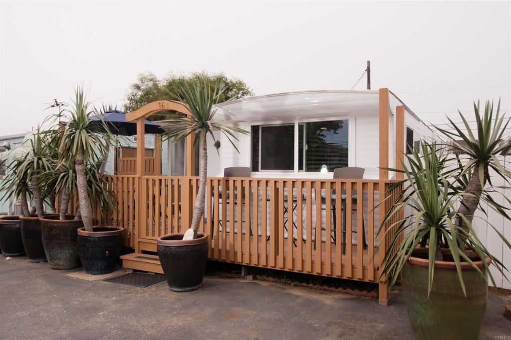 Welcome to your dream beachside retreat in the heart of Oceanside! This stunning fully remodeled 2 bedroom, 1-bath home offers modern comfort and an unbeatable location. Just TWO blocks from the ocean and within walking distance to vibrant downtown Oceanside, you'll enjoy the perfect mix of relaxation and coastal city living. Inside, the bright, open concept living space features brand new flooring, a sleek modern kitchen with beautiful countertops, custom cabinetry, and stainless-steel appliances. The bathroom has been beautifully updated with designer finishes and spa-inspired touches. Every detail has been thoughtfully upgraded—new doors, lighting, and fresh coastal-inspired paint throughout. Enjoy your morning coffee on the sunny front deck,or entertain in your private backyard oasis—perfect for barbecues and beachside hangouts. For the beach goes enjoy the outdoor showers. With its prime location and incredible updates, this home is perfect for those seeking a coastal lifestyle or potential renters looking to enjoy the best of Oceanside. Don’t miss out on this rare opportunity to own a slice of paradise!