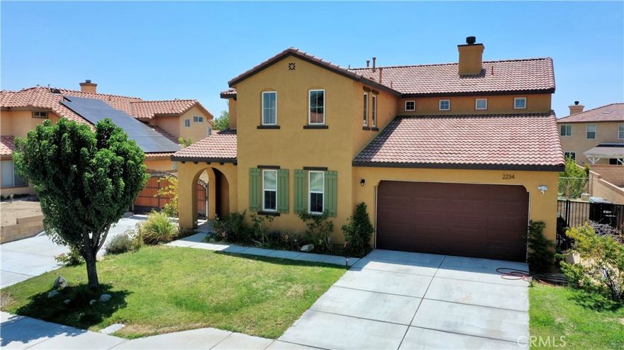 Welcome to this beautifully maintained two-story home, built in 2007, located in a fantastic Lancaster neighborhood. Offering 4 bedrooms and 3 bathrooms, this residence combines comfort, function, and style with thoughtful details throughout. Step inside to find high ceilings, dual pane windows, and an inviting family room with a wood/gas fireplace. The spacious kitchen features an island, abundant cabinet space, and built-in stainless steel appliances perfect for cooking and entertaining. Flooring includes tile, laminate, and carpet on the staircase, balancing durability and warmth.

Upstairs, the laundry room adds convenience, while the primary suite provides a true retreat with two closets (including a walk-in), a private bath with dual vanities, soaking tub, separate shower, and private toilet room. All bedrooms include ceiling fans for year-round comfort.

Additional features include central air/heat, direct-access garage with space for three vehicles, and a large backyard with RV access ideal for outdoor gatherings or extra storage. This home has been very well cared for and offers the perfect balance of space, comfort, and convenience in a welcoming neighborhood.
