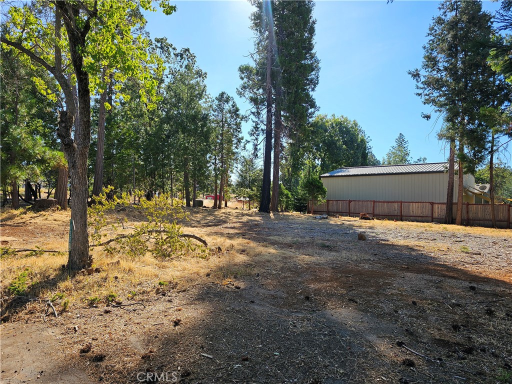 Charming Corner Lot Nestled in the Pines – Prime Central Location!
Don't miss this unique opportunity to own a beautifully situated corner lot surrounded by majestic pines! This desirable parcel offers the perfect blend of natural beauty and convenience, located just steps from the community park and close to local amenities, schools, and shopping.