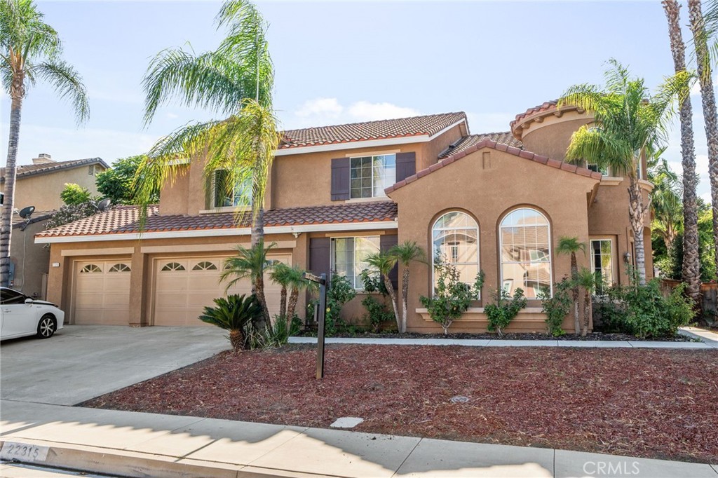 LOCATION! LOCATION! LOCATION! Stunning two-story home located in the highly desirable Wild Rose Ranch Community in the beautiful city of Corona. This beauty features 6 bedrooms, 3 full bathrooms and additional half powder bathroom. This lovely home includes a bedroom suite on the downstairs floor with its own private bathroom, perfect for the in-laws or family members unable to access the second floor. It also has an amazing large master bedroom with a private bathroom with double sinks and a separate soaking tub and a walking closet and four additional bedrooms. As you enter your new home, an elegant foyer with high ceilings and lots of natural light will welcome you and will direct you to the large living and dining areas. Perfect to entertain your family or guests. The family room features a classic and elegant fireplace, and it is divided from the dining and kitchen area by laminate floors that will match the floors on the stairway leading to the second floor. The large kitchen attributes include building appliances and a classic white tile counter tops and double oven. Recessed lighting and ceiling fans in key areas of the house with a glass sliding door connecting the dining area to the back yard. This gem also comes with a large loft area that can be used as a game room, an office space or a playroom. Two separate and spacious stairways that lead to different areas of the house. 3 car garage, and a lovely private shaded deck for those family gatherings. Your future home offers the perfect blend of location, functional and well-developed outdoor space with lots of potential for future improvements. Don’t miss out on this once in a lifetime opportunity to call this property YOUR HOME with 40 SOLAR PANELS FULLY PAID OFF.