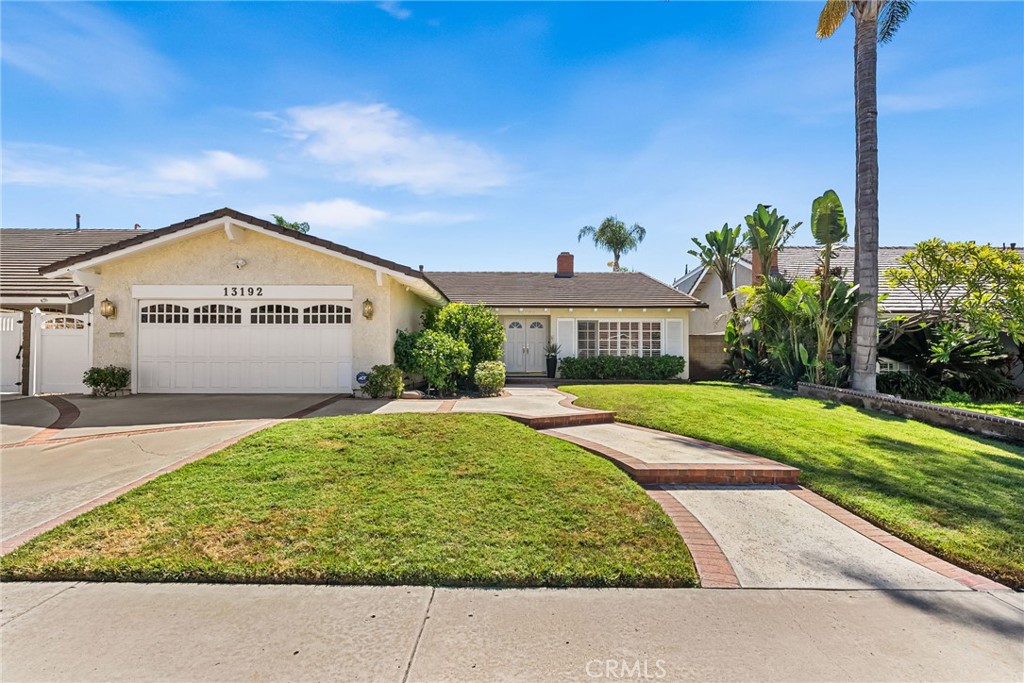 Highly desirable East Tustin location, tucked away on a quiet cul-de-sac bordering Tustin Ranch. This beautifully updated single-story home combines comfort, style, and convenience—just minutes from The Tustin Marketplace, major freeways, toll roads, and award-winning Tustin schools. Inside, a light-filled open floor plan showcases fresh paint, new plush carpet, plantation shutters and soaring ceilings that enhance the sense of space. The inviting living room with a cozy fireplace flows seamlessly into the dining room, creating the perfect setting for gatherings. Designed for both comfort and style, the bright kitchen and casual dining nook open to the inviting family room, where expansive windows with classic plantation shutters and motorized coverings frame serene views of your private backyard. Step outside to enjoy a generous covered patio, sparkling pool and spa, and a putting green designed for relaxation and fun. Vaulted ceilings in the main living spaces and a versatile den off the entry that doubles as a home office or optional fourth bedroom add flexibility. The primary suite offers a spacious retreat with an airy bathroom and private access to the backyard. The flexible layout creates a seamless connection between the inviting interiors and the backyard retreat. This Tustin home offers the perfect setting for entertaining both inside and out. Welcome home!