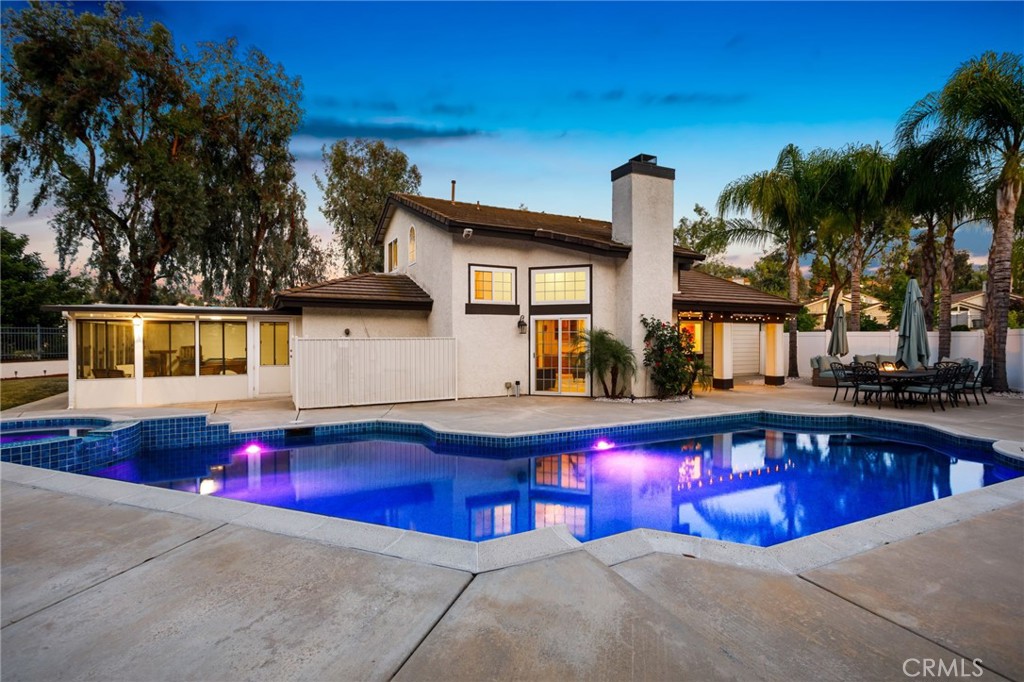 Beautiful Cul-De-Sac Pool Home with Multigenerational Layout in Villa Avanti! Tucked at the end of a quiet cul-de-sac in the desirable Villa Avanti community, this stunning Temecula pool home offers the perfect blend of comfort, space, and flexibility. Set on a generous lot, this well-maintained, turnkey property is ideal for multigenerational living with two bedrooms, a den, and a full bathroom conveniently located on the main floor. Step into the bright and airy 300-square-foot sunroom—perfect for relaxing or entertaining—just steps from your sparkling pool, recently upgraded with a new pebble tech coating. Inside, you’ll find durable porcelain tile flooring, custom oak cabinetry throughout the kitchen, breakfast nook, and family room, and recessed lighting that adds warmth and sophistication. Upstairs, retreat to your private primary suite complete with an en-suite bathroom, offering a peaceful escape from the rest of the home. Additional updates include interior paint and thoughtful touches throughout. Enjoy being minutes from Wine Country, shopping, dining, and easy access to the 215, and 15 freeways. Located in the highly-rated Temecula Valley Unified School District, with K-12 schools less than a mile away. Don’t miss your opportunity to own a home that checks all the boxes—space, location, upgrades, and lifestyle!