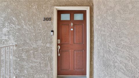 Photo of 2320 Del Mar Way #305, Corona, CA 92882 (MLS # CV26094418)