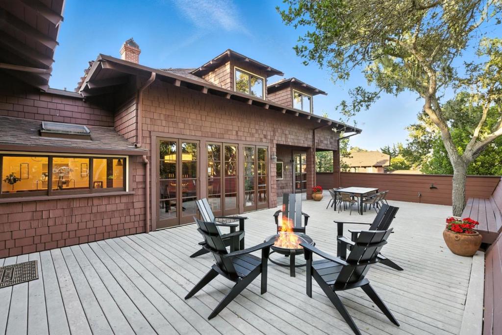Welcome to 600 Martin Street, a historic treasure located in the heart of Monterey. Originally built in 1895, and once the summer vacation lodge of President Herbert Hoover and his wife Lou Henry, this timeless home is rich in history and classic beauty. The original redwood interior evokes a sense of authenticity, perfectly complementing the home's Arts and Crafts architectural style. Featuring high ceilings throughout, 3 stone fireplaces, large bedrooms and bathrooms, and an upstairs bonus room, perfect for an office, playroom, or bedroom/guest space. An attached 600 square foot studio with a separate meter is complete with an additional separate entrance, private patio, kitchen and bathroom, and can be used as added guest space or a rental. Recent upgrades include a 3 year old roof, owned solar panels, updated exterior and interior painting, augmented French drains, efficient water heater, historic wiring renovation, and more. 600 Martin Street is an official Mills Act home, a qualified historic property in California receiving property tax relief in exchange for maintaining and restoring the property. Affectionally known as The Henry-Hoover house, experience authentic sophistication in this beautifully preserved Monterey gem.