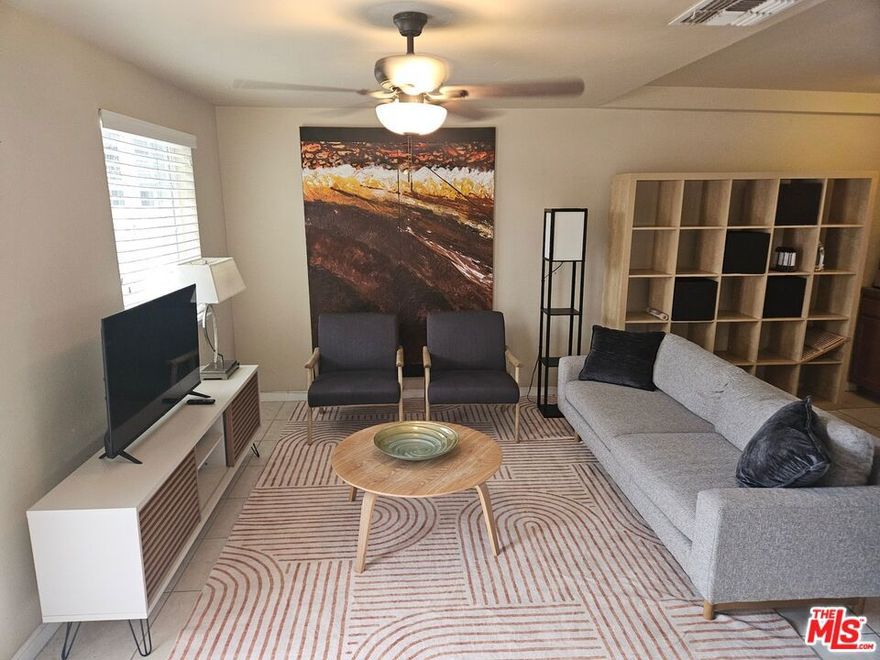 This furnished 2 bedroom 1 bath home has tile flooring in the living areas and berber-type carpeting in bedrooms. The kitchen has a gas stove, fridge, microwave, washer and dryer. The larger bedroom features a comfortable queen bed and single rollaway in the office area/second bedroom. Great Warm Sands location with off street parking for 2 cars, 3 outdoor patio spaces and very quiet!