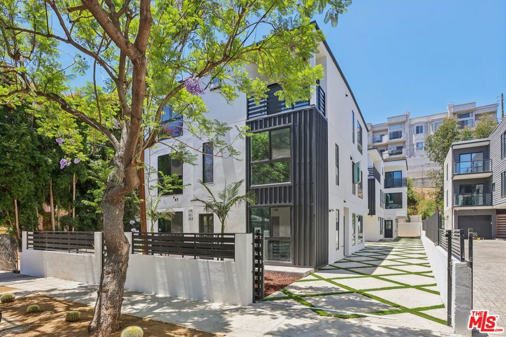 **ONCE IN A LIFETIME OPPORTUNITY TO OWN THIS BRAND NEW FOURPLEX 50% Leased** | Luxury Living in Beachwood | REAL 6.43% Cap ! This stunning property is not only a prime real estate asset but it will also generate generous income offering an exceptional return on your investment. It features two 4-bed townhomes and two 5-bed townhomes. All units come with designer finishes, high ceilings, all-equipped kitchens with stainless steel appliances, wrap around balconies, attached garages plus on site parking, solar panels fully paid for, and so much more. Top tier construction. All units are separately metered and to make it even better it will be delivered with a 10 year builder's warranty. This is a prime investment opportunity. Make it yours.