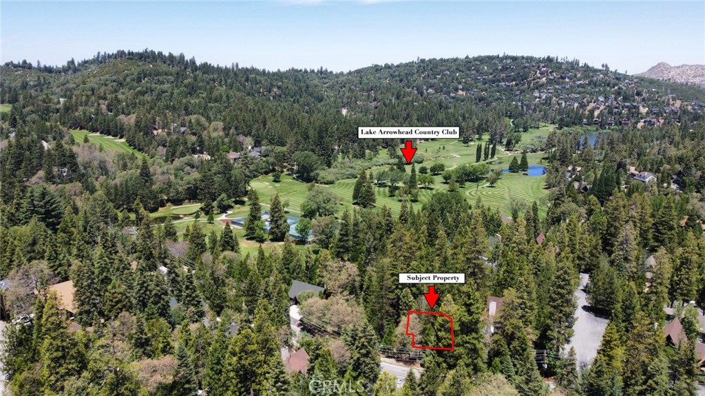 Nestled in the serene beauty of prestigious Lake Arrowhead, this prime vacant lot offers a rare opportunity to build your dream mountain retreat within the exclusive Lake Arrowhead Country Club Villas gated community. Set in a quiet cul-de-sac & accesible from Grass Valley Rd, this lot is ideal for building a custom mountain home. The community is well-maintained, secure, and just minutes from Lake Arrowhead Village, golfing, shopping, dining, hiking, lake activities, and year-round outdoor recreation. This land comes with Lake Rights and just steps away from the green. Lake Arrowhead Country Club is a private golf course. This lot is right next to #4. Buyer is advised to do their due diligence and verify all information.