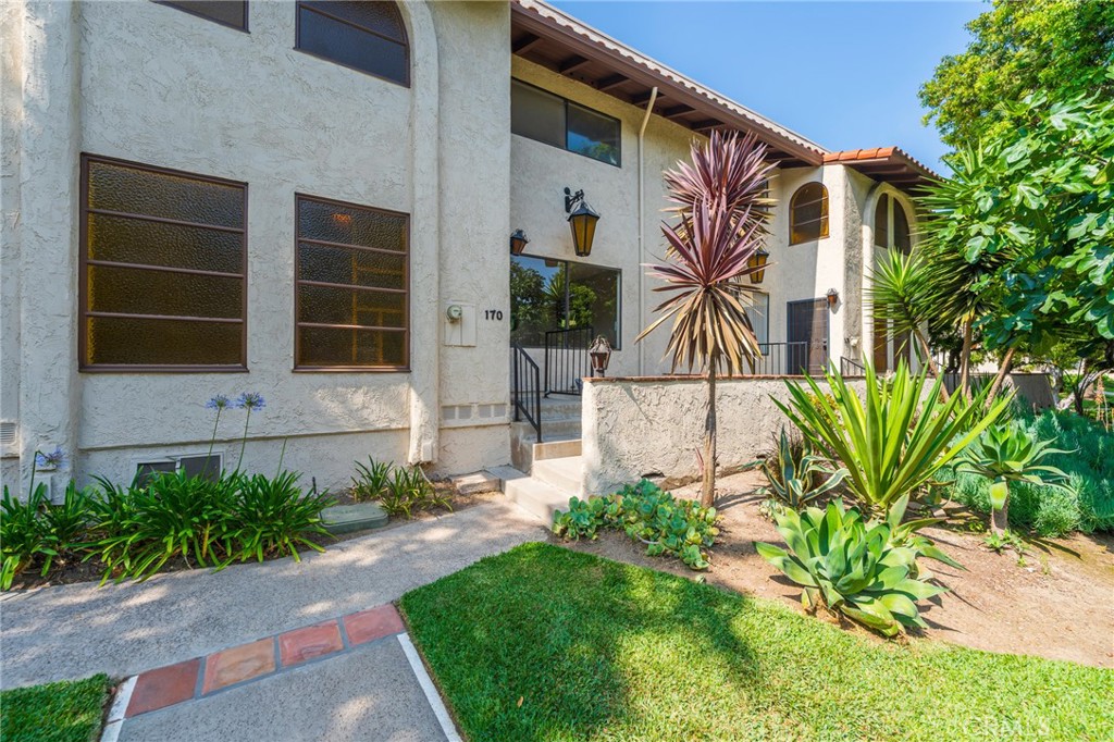 Welcome to 400 S Flower St #170 in the heart of the City of Orange! This charming attached single-family residence offers 2 spacious bedrooms plus a versatile bonus room perfect as a third bedroom, guest room, or home office. The large living room flows into a generous dining area just off the kitchen, creating an ideal space for gatherings and everyday living. You'll appreciate the convenience of an indoor laundry room and enjoy outdoor relaxation on the private patio off the kitchen or the welcoming front porch.
Situated directly across from the community pool, spa, and clubhouse, the home is surrounded by beautifully maintained greenbelt areas that enhance the tranquil setting. The attached two-car garage with direct access adds ease and security. Located near iconic destinations such as Disneyland and Old Towne Orange—with its charming antique shops, boutiques, and quaint eateries, plus a weekly Farmers and Artisans Market every Saturday—this property is also just minutes from Angel Stadium, the Honda Center, and Chapman University. With all of this and low HOA dues, it offers a truly prime location. For commuters, the Orange Metrolink Station is close by.
This is a probate sale with Full Authority and does not need court approval. No warranties, guarantees or representations regarding the adequacy, condition, performance, suitability of the property or its systems or components are expressed or implied. Buyers shall be responsible for any and all repairs and reports associated with the sale of the property.