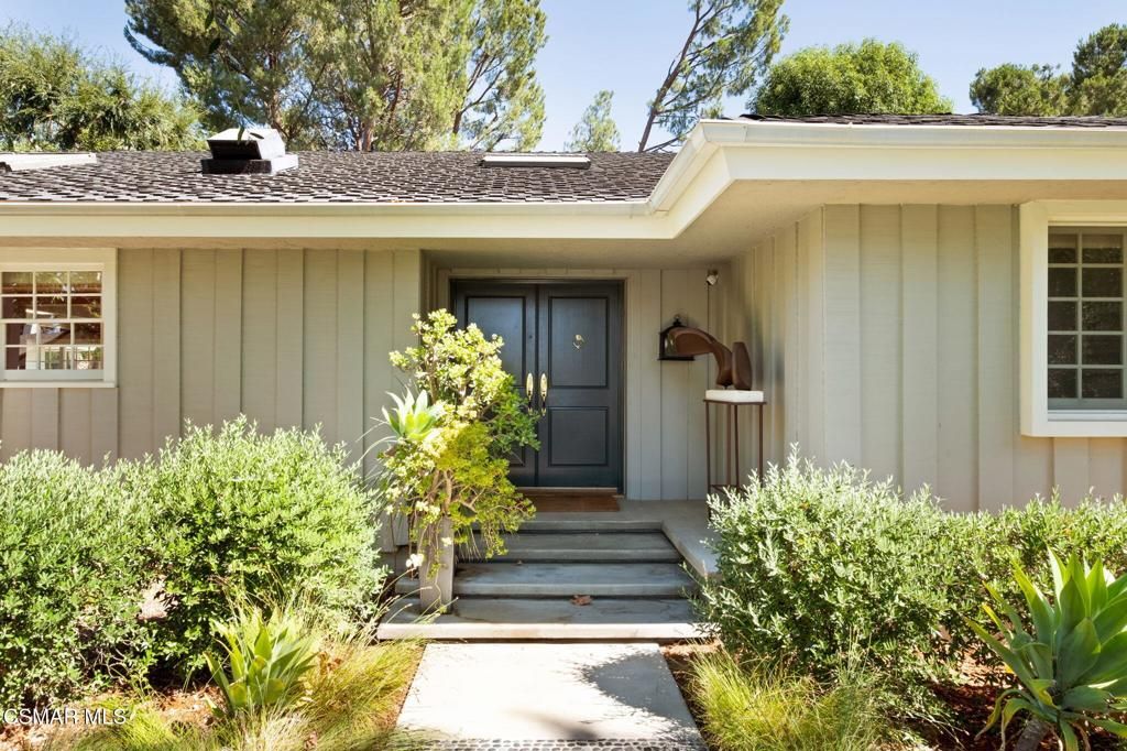 Photo of 4658 Del Moreno Drive, Woodland Hills, CA 91364 (MLS # 225004509)