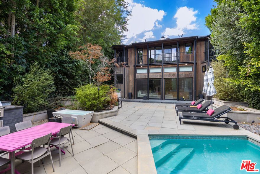 For Lease Modern 4-Bedroom Retreat with Pool, Sauna & Smart Home Features in Sherman OaksLive in comfort and style in this contemporary home located south of Ventura Blvd in one of Sherman Oaks' most desirable neighborhoods. Thoughtfully designed with high-end finishes, the home features a chef's kitchen with Columbia cabinets, quartz countertops, Miele appliances, a breakfast bar, and a dumbwaiter for easy grocery access.The upper level includes a light-filled living room with treetop views, a gas fireplace, dining area, three bedrooms, and two full bathrooms one bedroom is currently set up as an office. The lower level offers a spacious primary suite with en-suite bath, den, family room, powder room, laundry area, and smart home hub wired throughout the house.Enjoy a private backyard setup designed for wellness and entertainment, including a swimming pool with waterfall, built-in BBQ, fire pit lounge area, outdoor sauna, cold plunge, and included exercise equipment.A rare leasing opportunity that blends convenience, comfort, and modern amenities in a top-tier location. Available now. Tenant is responsible for all utilities. Owner pays for the gardener and pool upkeep.