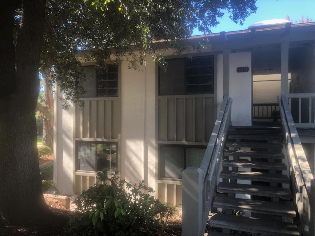 Upstairs end unit with large balcony facing the mountains and the sports court. The Villages is 55+ senior community with golf course, tennis and paddleball courts, clubhouse, walking trails. Primary bedroom with updated bathroom, double closets. Spacious Living room with Dining area