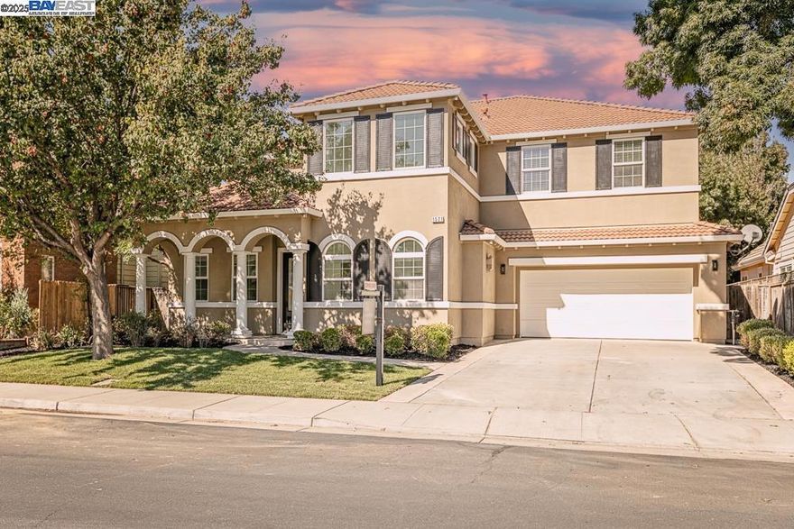 Beautifully Updated Home in Elissagaray Ranch! This spacious 5-bedroom, 4.5-bath home offers over 3,700 sq ft of stylish living space on a 7,516 sq ft lot. Thoughtfully updated with new carpet, luxury vinyl plank (LVP) flooring, and freshly painted interior and exterior, this home seamlessly blends elegance with modern comfort. The grand entry opens to formal living and dining areas, while the open-concept family room features a cozy fireplace and flows seamlessly into the gourmet kitchen—complete with granite slab countertops, stainless steel appliances, large center island, and walk-in pantry. A full bedroom suite on the main floor is ideal for guests or multi-generational living. Upstairs offers a spacious loft/bonus room and a luxurious primary suite with dual vanities, soaking tub, and two walk-in closets. Each bedroom has access to a full bath. Additional highlights include a 3-car garage and a landscaped backyard perfect for relaxing or entertaining. Located in the highly sought-after Elissagaray Ranch community, close to top-rated schools, parks, and commuter routes.