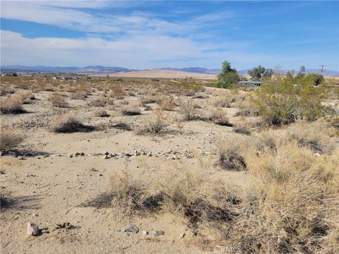 Photo of 7100 Wilshire Avenue, 29 Palms, CA 92277 (MLS # JT25082104) Photo of 7100 Wilshire Avenue, 29 Palms, CA 92277 (MLS # JT25082104)