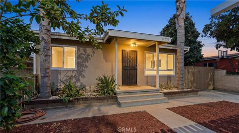 Photo of 11233 Virginia Ave, Lynwood, CA 90262 (MLS # DW26062547)