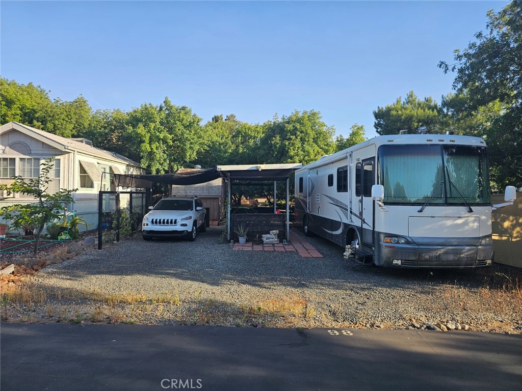 A no land lease space is available for sale with an RV included located in the gated 55+ community of Meadowbrook RV Park. It is sold as a membership or simply put, fractional ownership into the RV park. A membership is one's right to a park site for personal use for life: Permanent and/or attached improvements remain with/on the site. All membership sites are "approximately" 2400 square feet with dimensions of approximately sixty (60) feet long and forty (40) feet wide. Measurements depend on the terrain. This 1 bedroom, 1 bathroom RV is in a great location, 15 minutes from the Outlets at Lake Elsinore and Lake Elsinore. Shopping, dining and attractions close by. It includes the storage shed, patios and patio covered areas pictured. Site has enough space to park multiple cars. You are buying the membership and improvements that goes with site #98. To be clear, there is no land lease here, you are buying a fractional ownership with your space in the RV park and that comes with all improvements and rights to use park amenities.
The park features a catch and release fishing pond, community bathrooms and showers on site, a club house recreation area with billiards, a kitchen and group activities for park residents. There is also green belt walking areas, a dog park and an on site laundry facility. Low base HOA fee of $261.77/month: includes water, trash, use of park amenities and internet/WiFi; plus, electricity** and additional towards park maintenance & utility fee***
** electricity is billed based on your own consumption and exactly what the park is billed.
*** park maintenance & utility fee is based on electric consumption and is for park electricity, maintenance of electric equipment, etc. This a low cost living at it's finest, once your membership / fractional ownership in the RV park is paid, your utilities and HOA fee is all you pay. There is no monthly land lease to be clear.
Call today to see the site and facility, tour is by appointment only. Cash or owner financing option is available. Do not pass up this golden opportunity.