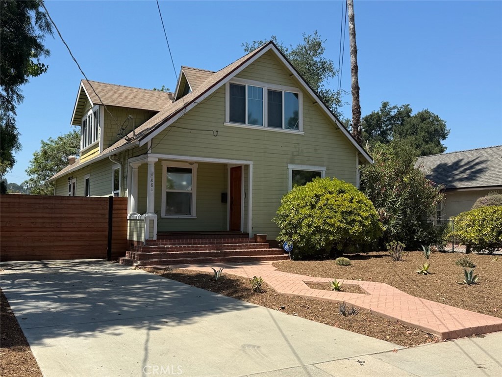 This Craftsman duplex, built in 1905 and updated over time, features two vacant units. Lower Unit (approx. 1,176 sq. ft.): 3 bedrooms and 2 bathrooms. The living room includes a fireplace, chandelier, and wood-beamed ceiling. The dining area has a built-in buffet. The primary bedroom at the rear has a walk-in closet and private bath. Two additional bedrooms share a bathroom with a jack-and-jill closet. The kitchen includes a stove, microwave, dishwasher, refrigerator, washer, and dryer. Upper Unit (approx. 621 sq. ft.): 1 bedroom and 1 bathroom. Updates include new flooring, updated kitchen, interior paint, and a new entry door. Features vaulted ceilings, range, refrigerator, and stacked washer/dryer. The unit has a private side entrance. Additional Features: Privacy fence with motorized gate, backyard with mature fruit trees (avocado, Valencia orange, Navel orange, and lemon), CalSpas hot tub, and a two-car garage. Both units include central air and a security system. Convenient access to the Rose Bowl, Old Town Pasadena, JPL, and the 210 Freeway.