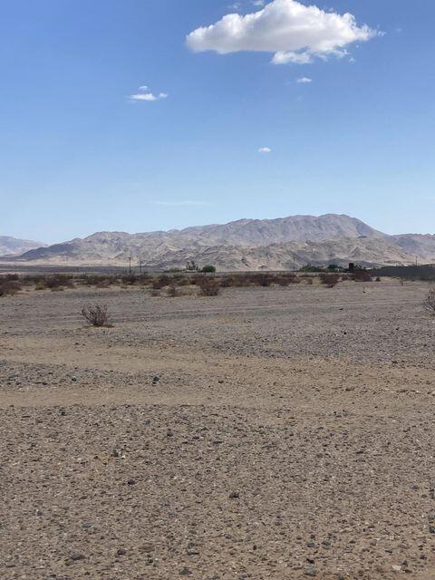 Explore the enchanting beauty on the edge of Joshua Tree with this expansive property at 60600 Winters Road. Spanning an impressive 1,732,816 square feet, this lot offers an extraordinary opportunity to own a large piece of the iconic desert landscape.Set amidst the serene and picturesque surroundings of Joshua Tree, this property promises breathtaking views and tranquility. The vast lot size provides ample space for creating your dream desert retreat, with potential for development while maintaining privacy and seclusion.Imagine living in harmony with nature, where the open skies and starry nights become your daily backdrop. Whether you're inspired to build a custom home, establish a private getaway, or hold the land as an investment, the possibilities are as boundless as the horizons.This property is conveniently located to enjoy all that the Joshua Tree area has to offer, from the national park's stunning vistas to the vibrant local art scene.