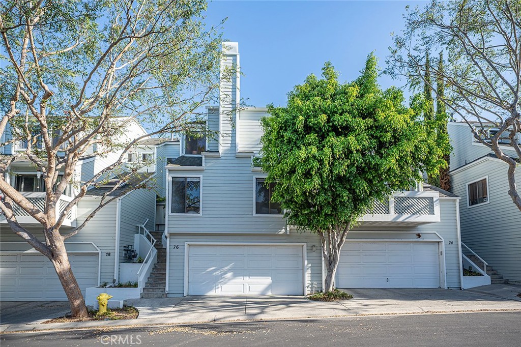 Welcome to the pristinely-maintained Baywatch Townhome Community - where privacy and seclusion boasts of a highly sought after tranquil lifestyle. Positioned away from the main road & tucked towards the back of the complex, this 3 bedroom 3 bathroom tri-level home allows your everyday routine to be marked by a peaceful experience. Upon entry, you're welcomed to the main floor that feels grand, effortlessly open, & basking in natural light highlighted by beautiful Mediterranean tile. There is no shortage of dwelling with both an extravagant formal dining room and a casual bistro nook, a laid-back lounge area accompanied by a wet bar and built-ins, as well as an oversized family room with a statement stone fireplace great for entertaining or unwinding. The kitchen has been intentionally preserved with a full appliance ensuite, recessed lighting, tile counters, pull out trash cabinet, and an extended granite bar top for every day seating. Transition smoothly to the rear patio that offers a quiet outdoor space for mixed use & surrounded by sleek vinyl fencing. Before venturing upstairs, extra storage space never goes unnoticed with linen cabinets mirrored by an overflow pantry closet just outside the conveniently located half bathroom. Upon the landing, two guest bedrooms are situated to towards front of the home, one of which offers a flexible office/work space while both rooms are nestled between the renovated full bathroom. On the opposite side resides the primary bedroom ensuite that brags of soaring ceilings, a private balcony, and an intimate nook for reading, writing, or a morning cup of coffee. Nothing says retreat quite like a remodeled bathroom highlighted by glass shower enclosure, a luxurious soaking tub, oversized dual sink vanity, & a walk-in closet - an ambiance that can’t be described but must be felt! On the lowest level of this townhouse, there is even more storage offered with a deep step-in closet, a converted wine cellar room, and an individual laundry room and a mechanical closet all with direct access to the two car garage. Notables worth mentioning: new garage door motor system, eco friendly tankless water heater, central AC, full interior paint package, hardware & light fixture upgrades, honeycomb style pull-down window shades. This growing seaside town has nationally recognized landmarks, a thriving arts scene, and ocean-based adventures -redefining what coastal living in a diverse community looks like in the city of San Pedro!
