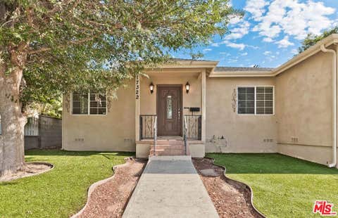 Photo of 17322 Martha Street, Los Angeles, CA 91316 (MLS # 26870373)