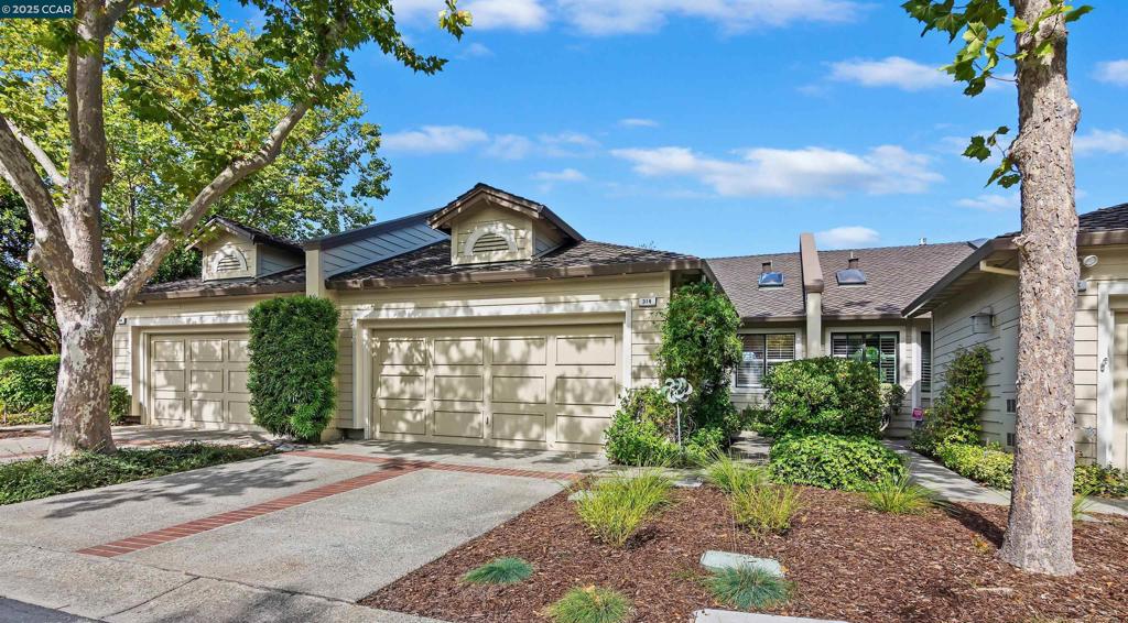 Beacon Ridge end of cul-de-sac with primary on main level! Gated community on the Lafayette/Walnut Creek border with Lafayette/Acalanes schools, Beacon Ridge offers a serene setting with pool, spa, tennis/pickleball courts, mature trees & landscaping, & views of the surrounding hills. An especially desirable floor plan with the primary on the main level, high vaulted ceilings, skylights, modern updates & a bonus room. Glass siding doors from each room offer excellent indoor/outdoor enjoyment. Hardwood floors, new carpet, plantation shutters, noteworthy updates to two bathrooms. Private setting surrounded by lovely mature trees with views of the hills. Sunny kitchen & breakfast room offers Electrolux stainless steel appliances. Spacious primary suite on the main level has a large walk-in closet, lovely bathroom w double vanity & private w.c. Sophisticated powder room. Laundry room w built-in cabinetry. Two-car garage w interior access. The location within Beacon Ridge is spectacular. Guest parking, a grassy field & and beautiful mature trees. There is a walking path down to Springhill Elem and Acalanes High School. Adjacent open space w gate access to hiking trails. Minutes to vibrant downtown Lafayette and Walnut Creek for shopping and restaurants, and easy commute access.