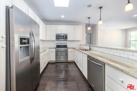 Photo of 10639 WOODBRIDGE Street #303, Toluca Lake, CA 91602 (MLS # 26662191)