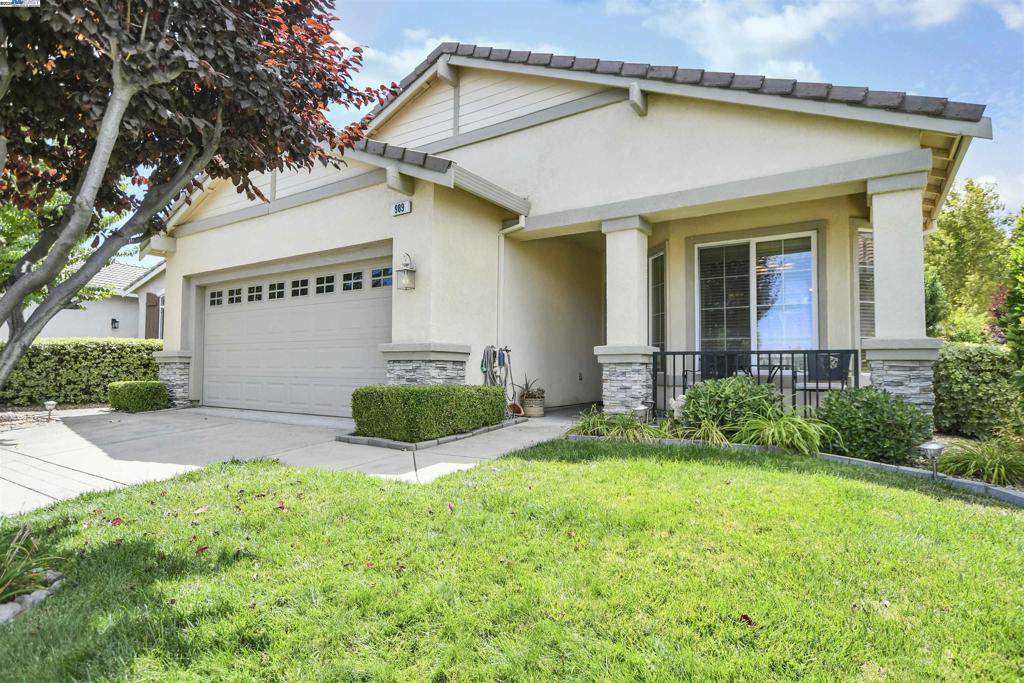 SUMMERSET 4! 55+GATED COMMUNITY WITH POOL, CLUBHOUSE, BOCCE BALL, TENNIS, PICKLEBALL AND MORE - Open floor plan with 2 bedrooms & 2 full baths - Chef's kitchen w/Corian counters, abundance of cabinets, casual dining area + eat at bar - Spacious great room with fireplace & built in TV Niche - Primary bedroom with walk-in closet, stall shower & door to backyard patio - Indoor laundry room with cabinets & sink - Entertainer's backyard with covered patio area and no rear neighbors - Close to golf courses, shopping and restaurants - All this and more...