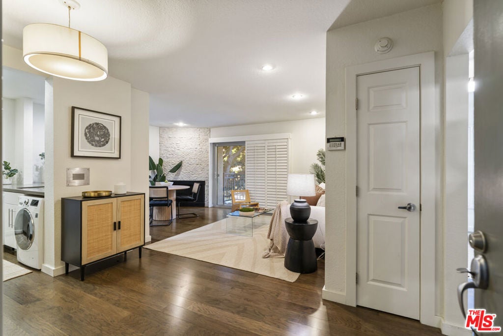 141 S Clark Drive 210