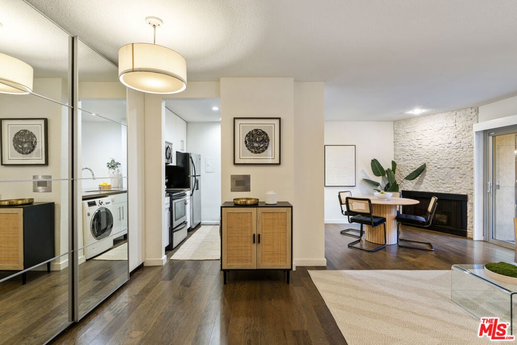 141 S Clark Drive 210