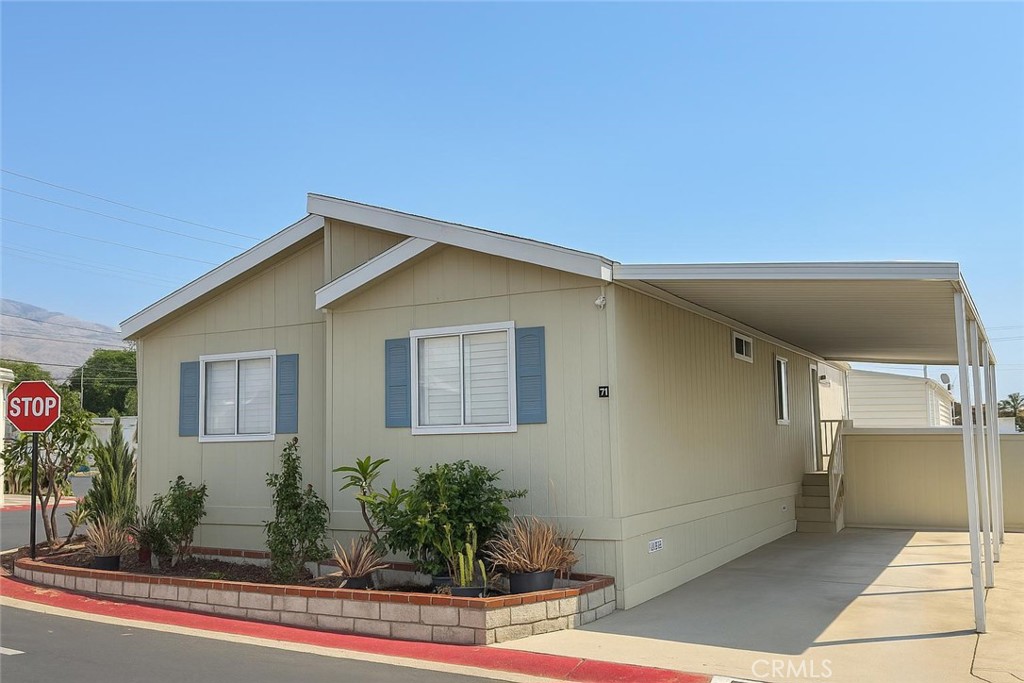 A wonderful mobile home situated in a nice community for all ages with beautiful mountains views. Home features 3 bedrooms and two full baths, spacious kitchen with ample counter and cupboard space, with separate living and dining area. Primary bedroom is on one side of the home and is good size with a walk in closet. Primary Bathroom has shower in tub. 2nd and 3rd bedrooms are off the other side of the living room. Great sized laundry room. Carport for parking fits up to 3 cars and shed. Conveniently located to shopping center, schools, restaurant and freeway. The community offers 2 pools, clubhouse, playground, and billiard room. Don't miss out on this great opportunity for a turnkey mobile home.