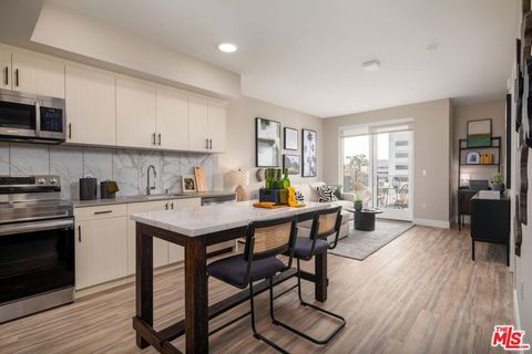 Photo of 201 N La Brea Avenue #314, Inglewood, CA 90301 (MLS # 25628347)