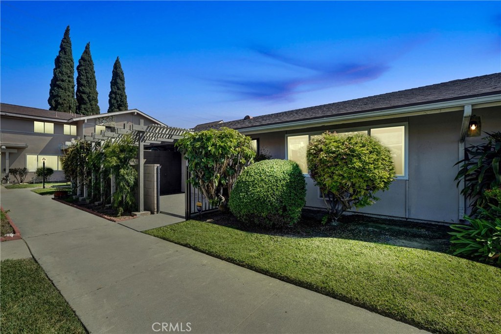 Price Just Reduced to $450,000 – Best-Priced Remodeled Home in the Area! Welcome to 10757 Magnolia Ave #102, a fully remodeled, modern single-story condo in the highly desirable and gated Coco Palms West community in Anaheim—where homes rarely become available. This 1-bedroom, 1-bathroom home offers 817 sq ft of stylish living space with a contemporary open floor plan, featuring new luxury waterproof vinyl flooring throughout and non-slip ceramic tile in the kitchen and bath. The upgraded kitchen is equipped with soft-close shaker cabinets, granite countertops, black appliances, and a utility sink with pull-out faucet. The bathroom has been fully remodeled with a dual-sink granite vanity, custom tiled tub surround, new mirror, toilet, and handheld showerhead. Additional highlights include dual-pane windows, fresh two-tone paint, upgraded baseboards, ceiling fans, a brand new 12,000 BTU wall-mounted AC unit, a newer heating system (2 years), a new water heater, and a laundry closet with washer/dryer hookups. A private patio with wood lattice cover and two dedicated parking spaces (one carport, one assigned) add convenience and comfort. The low HOA includes water and trash and provides access to resort-style amenities, including a sparkling pool, BBQ area, and lush landscaped grounds. Conveniently located near Disneyland, the Anaheim Packing District, Angel Stadium, shopping, dining, and major freeways, this is a rare opportunity to own a beautifully upgraded home at an unbeatable price in the coveted Coco Palms West community.