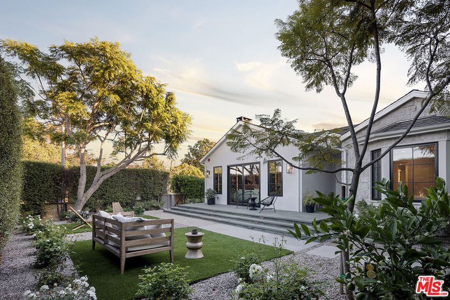 Tucked away on a quiet, tree-lined street North of Montana, 2515 Marguerita Avenue offers a refined blend of coastal ease and architectural elegance. This brand-new, single-level home includes a fully equipped guest house. Inside, the naturally lit interior contains an open living space and bar for easy gatherings. Beam ceilings, a chef's kitchen with Sub-Zero, Viking, and Miele appliances, and a serene indoor-outdoor flow make everyday living feel like a retreat. Each of the four ensuite bedrooms offers garden views and walk-in closets. A private, gated entry leads to a landscaped yard with a pool, terrace, and generous porchideal for warm Santa Monica evenings. Moments from the shops and cafs of North Montana Avenue and the Brentwood Country Mart, and just blocks from the beach and top-rated schools, this home balances privacy, comfort, and an effortless sense of place.