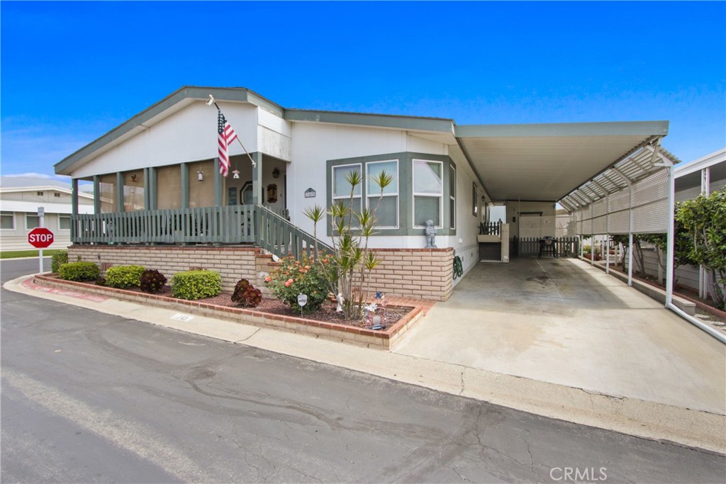Rare CORNER LOT at Foothill Terrace MHP!!(55+ Community) in La Verne. This Gorgeous SkyLine Triple Wide Manufactured Home is EXTRA Spacious with 1954 Sq. Ft of Living Space! TURNKEY!!! Home Features 3 Bed / 2 Full Bath UNIQUE Wide Open Floor Plan with High Ceilings, Ceiling Fans, and Laminate Flooring throughout. Home is situated with a NORTH/WEST FACING View of the of the San Gabriel Mountains. Dual-Pane Windows throughout allow lots of Natural Light into the Home! Energy Efficient 6 inch exterior walls provide extra insulation for the home. HVAC system replaced July 2024. Large Great Room and Dining Area, Beautiful Extra Large Kitchen with all the Amenities! Oak Cabinets with lots of Storage. Separate Dining Area in Kitchen for Table & Chairs. The Master Bedroom and Bath are Extra Roomy, The Master has a Large Walk-In Closet with Mirrored Doors. Corner Jetted Tub in the Master Bath. Enjoy the Lovely Covered Front Porch and take in the Beautiful View. Separate Laundry Room inside the Home with Access out to the Carport and Private Patio Area at the back of the driveway. This Home has been Lovingly Maintained and Shows Pride of Ownership. If you are looking to downsize without feeling cramped- This is the Home for you! Call to make your Appt to see this Gorgeous Home. Foothill Terrace is a Wonderful Place to Retire! Park features many different Social Club Events. 2 Clubhouse(s)! Both with Kitchen(s) for Special Events, a Pool, a Spa, Billiards, a Library & Gym. (Home is on Local Property Tax) Actual Measurements for home are 11.10" x 60 / 11.10 x 60 and 11.10 x 56) Current Spc Rent is $985. (will go up slightly for New Resident) Added bonus:: Home comes complete with Electronic Lift providing convenient EASY access for Wheelchair or Walker at Carport entrance)