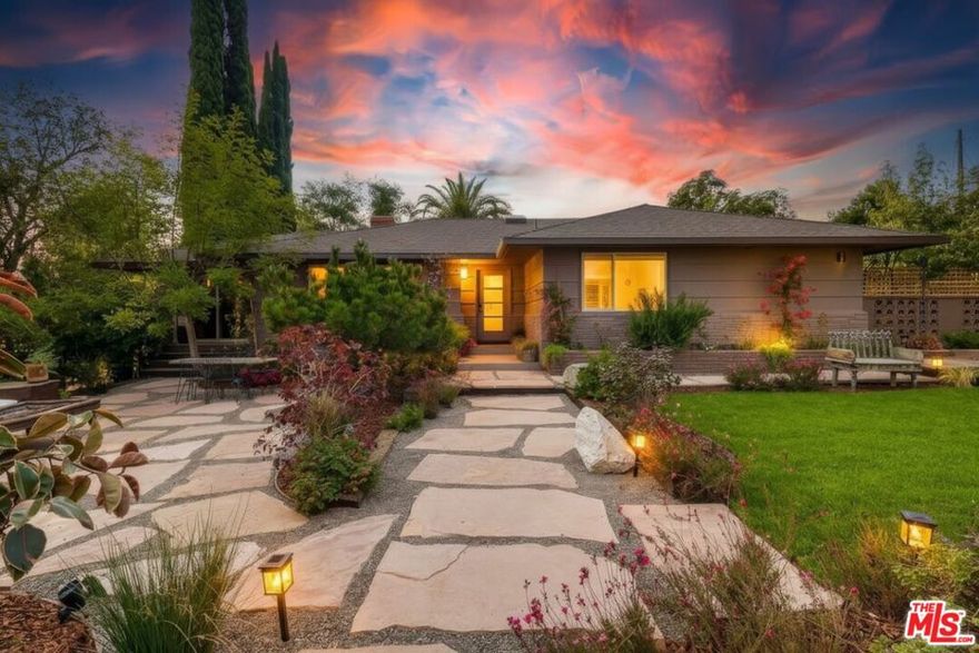 Nestled on a quiet cul-de-sac, this reimagined 4-bed, 3.5-bath mid-century ranch offers 2,506 sq ft of elegant living on a 0.32-acre lot with mature trees and San Gabriel Mountains views. Fully transformed with new plumbing, electrical, HVAC, windows, skylights, roof, and luxurious finishes, this home is designed for comfort and flow. Warm, contemporary interiors feature a spacious living room with a Roman clay fireplace, seamlessly opening to a dining room and serene garden with mountain views, perfect for dining and entertaining. The heart of the home, the kitchen, boasts marble counters, intricate tile, ZLINE appliances, and a built-in coffee bar. The family room opens to a deck and sunken backyard, effortlessly merging indoor and outdoor spaces. The primary suite is a peaceful retreat with a spa-inspired bath and private patio. Three additional bedrooms offer flexibility, including a junior suite with an en-suite bath and potential separate access. The property also features a designer powder room, skylit laundry, two-car garage, and ample driveway parking. Sierra Madre is a sought-after community with small-town charm, a walkable downtown, and cultural events like the Wisteria Festival. Experience Southern California living at its best, where indoor comfort meets outdoor beauty in a home redesigned for modern life.