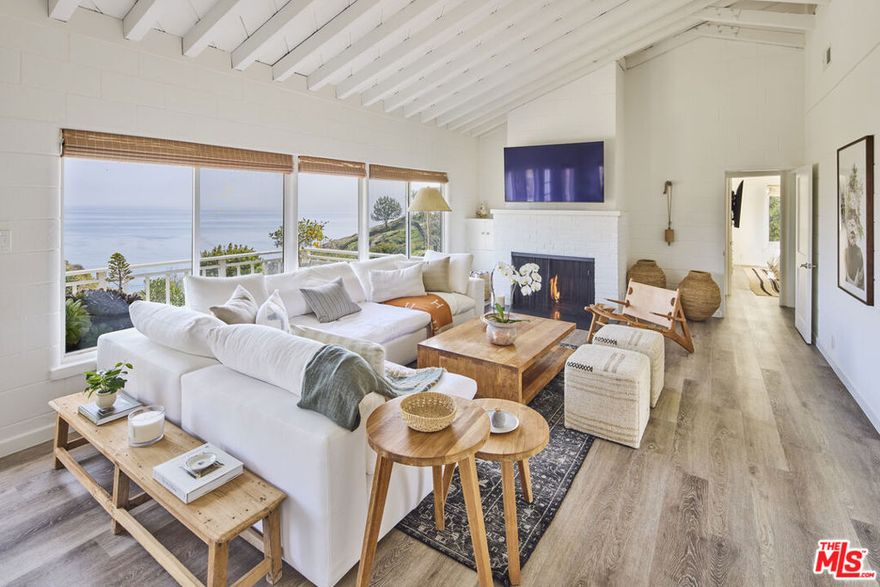 Discover the opportunity to reside on Zumirez Drive, one of Point Dume's most coveted addresses. This remarkable 1.34-acre estate currently features a beautifully remodeled 1949 two-bedroom seaside cottage with breathtaking whitewater views and direct access to a private beach just steps away. Fantastic ocean facing deck is perfect for watching dolphins play below and taking in the stunning sunsets. Perfectly positioned for easy walks to some of California's finest surf and sands, including iconic Paradise Cove and beach right to Riviera III.