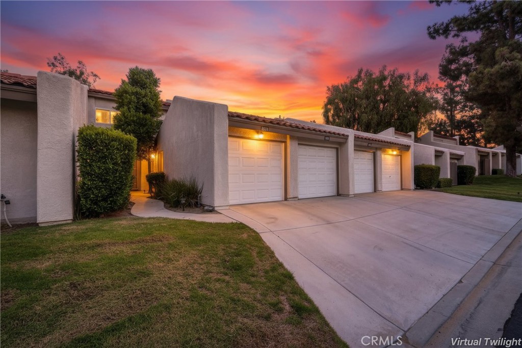 Prime location nestled up to the golf course in the desirable Ridgegate community centrally located in Murrieta Hot Springs. This beauty lives like a single-family residence with a highly prized lot backing up to the golf course with tranquil views of the peaceful greens. Step inside the light filled living area with vaulted two-story open beam ceilings, gorgeous Bamboo flooring, a stately stacked stone fireplace, wet bar, and serene golf course views through the large picture windows and sliders, providing an ideal indoor-outdoor living space for gatherings. The dining area is open to the kitchen with sliders opening to the patio, perfect for entertaining and BBQing with friends and family. The light and bright kitchen has an abundance of cabinet and countertop space and French doors opening to a private courtyard leading to the 1 car garage. In the entryway hall there is a convenient powder room with full size washer and dryer laundry closet and a nook under the staircase perfect for small workspace. Upstairs you will love the primary bedroom suite with a private view balcony overlooking the golf course, an inviting space perfect for enjoying an evening glass of wine with a loved one, and a spacious en-suite bathroom with two closets, mirrored closet doors, linen cupboards, framed vanity mirror, and a step-in shower. The second bedroom suite overlooks the living area with views of the golf greens, barn doors which can slide shut for privacy, mirrored closet doors, and a full en-suite bath. Community amenities include open unassigned parking spaces throughout the community, pool and spa, lounging and picnic areas. Superbly located close to an abundance of shopping and dining venues nearby, Murrieta Hot Springs Resort, The Golf Club at Rancho California, hiking and biking trails throughout Pond Park and Warm Springs Preserve. Just minutes from Lake Skinner Balloon & Wine Festival, and Pechanga. Easy 15 and 215 Freeway access.