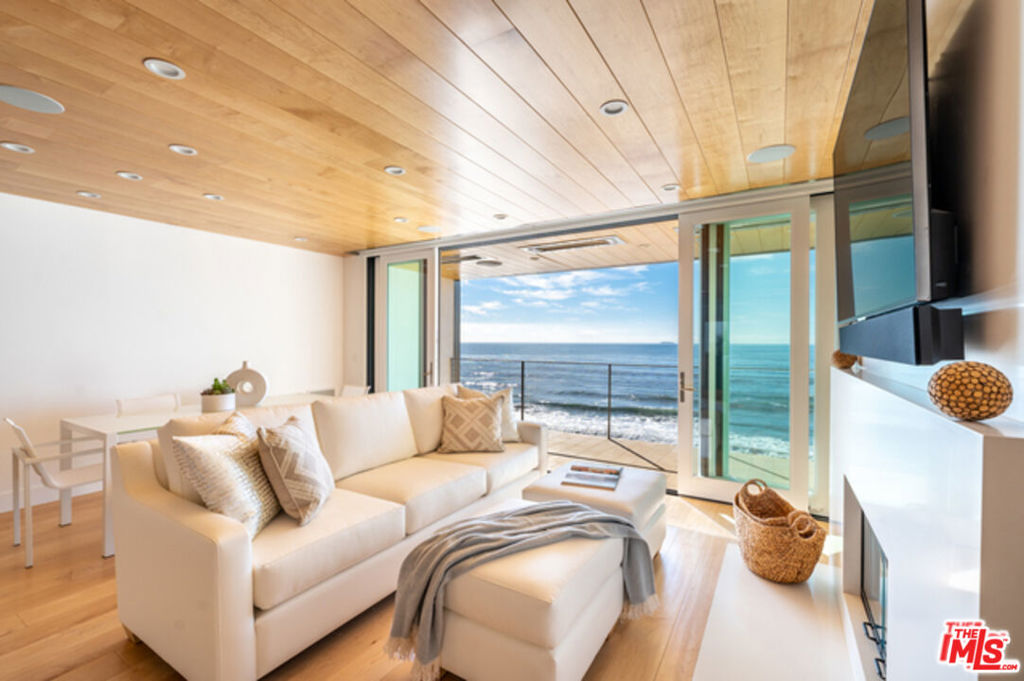 Gorgeous three-story home offers breathtaking ocean views and custom finishes that took years to complete to exacting specification for sophisticated living in sun-kissed Malibu. There are decks off the living room and the master bedroom with built-in heaters & speakers outdoors. The home was completely rebuilt from the studs & has all the bells and whistles. Apple TV, whole house water filtration, central air and heat, smart home operated by touch pads, wood-burning fireplace. New home was taken down to the studs & earthquake retrofitted. Separate temperature controls on each floor. Master bed is adjustable, both head and feet. Steam shower, heated floors in master bath, shower floor, shower seat & on the lower floor. Walk-in closet. All new plumbing and piping. Onyx bathrooms. Totally retractable patio doors for indoor-outdoor living. Cell phone booster included. Live large & in luxury in this special home custom made for the most discriminating person. Furnished or unfurnished. No Showings until July 7th, 2025 when current tenant will be moved out.