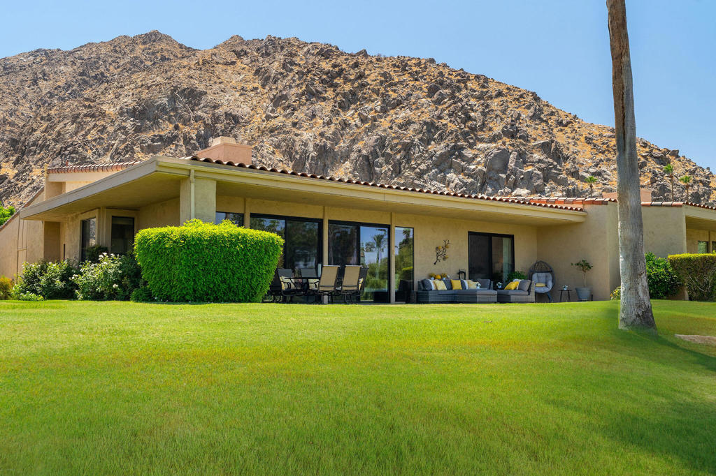 Prime location for this exquisitely updated condo in the Indian Wells Country Club! Don't miss seeing this! 3 bedrooms, 3 bath condo with an open view of the 18th Green of the Cove Course. Definitely one of the best views in the prestigious IWCC. 2 AC units and 2 water heaters. New kitchen with new double ovens, new refrigerator, new double dishwasher; new Quartz Counters and new pantry. New dual-pane sliders and window, new doors and handles throughout. Bar with icemaker and deep sink. Gas fireplace in the living room. New Fans, lights and speakers throughout. New carpet in bedrooms. Remodeled bathrooms with double sinks and showers. Indoor laundry. Misting System on back patio. 2 car plus golf cart garage with epoxy floor and insulated garage door. No stone unturned with this upscale remodel. Club membership is optional with several types of memberships. A member can take a short walk or ride to The Cove Clubhouse for Happy Hour or dinner. Enjoy the heated pool and spa nearby. Immediately enjoy the Indian Wells City Perks with discounts on restaurant, golf, usage of Fitness Center at the Hyatt and free BNP Tennis tickets. This condo will not disappoint. Move in and enjoy life!!