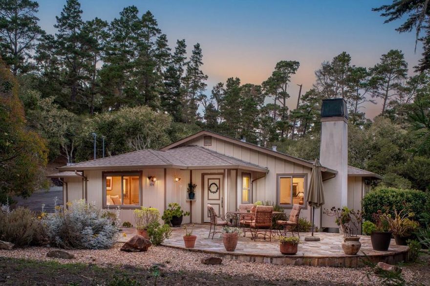 Centrally located within a few minutes' drive into downtown Carmel, Monterey, and all the incredible amenities the Peninsula has to offer, this lovely home built in 2015 in the sunbelt is designed to enjoy the idyllic indoor/outdoor living. With a large front patio and back deck, your days will be filled with fresh air and sunshine as you take in the surrounding forested views. The home is set on a considerable 1.65 acres and includes 2 bedrooms, 2 bathrooms and ~1,500 SqFt of light and bright living space. Other highlights include an open kitchen and dining area with breakfast bar, comfortable living room with fireplace, primary suite with french doors leading to the back deck, 1-car garage, spacious driveway with plenty of parking space, and beautiful grounds with lush landscaping and areas to explore. This is the perfect place to unwind after a day of exploring all the shopping, outdoor activities, and world-class restaurants within close proximity.