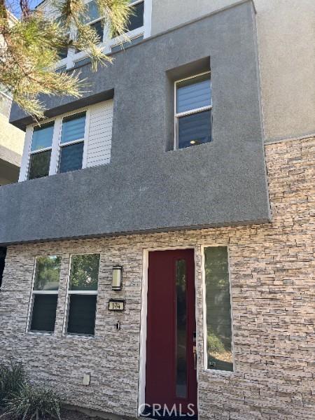 Discover modern living in this immaculate 2-bedroom, 2.5-bathroom home, perfectly situated in Irvine's desirable Great Park area. Boasting 1630 square feet of thoughtfully designed space, this residence offers an open floor plan bathed in natural light, complemented by an abundance of windows and elegant custom window shades throughout. Step inside to find a versatile den/office, ideal for remote work or a quiet retreat. The expansive living areas flow seamlessly, creating an inviting atmosphere for both daily living and entertaining. Enjoy the convenience of two dedicated garage spaces, complete with a custom dartboard for your leisure. Beyond the home, embrace a lifestyle of health, leisure, and connection within the vibrant Great Park community. Residents have exclusive access to a variety of resort-inspired pools, including invigorating lap pools, and can explore the scenic Bosque trails and pavilion parks, perfect for outdoor recreation and relaxation. Located within a highly-rated school district, this home offers an unparalleled opportunity to experience the best of Irvine living. Don't miss out on making this exceptional property your own!