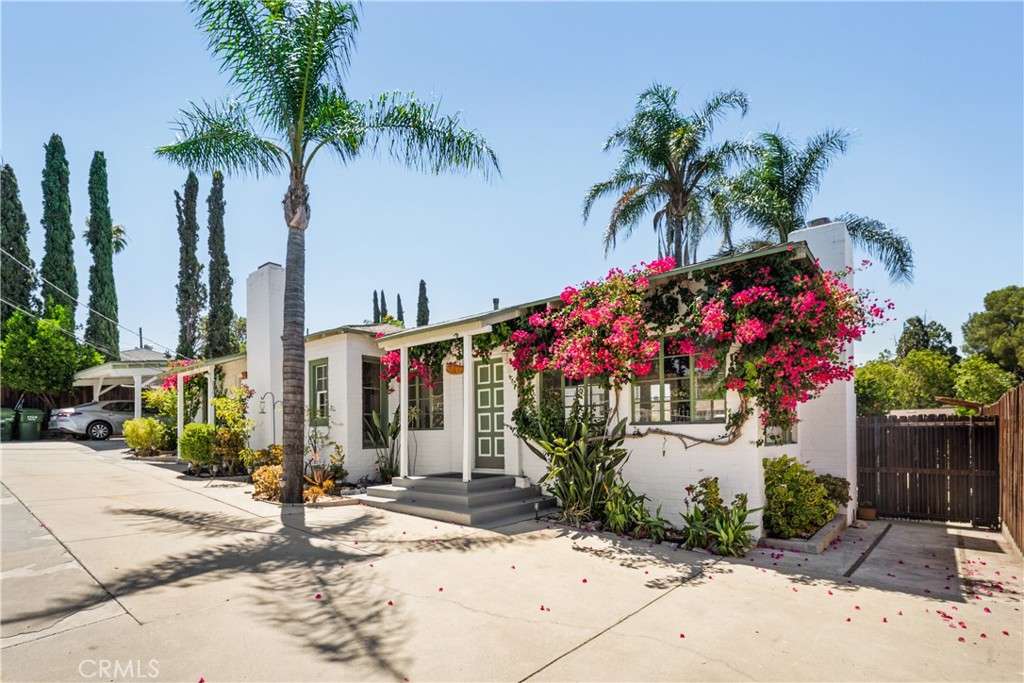 Welcome to this charming and meticulously maintained 3-bedroom, 3-bathroom home located in a prime Tujunga neighborhood above Foothill Boulevard. With 1,510 square feet of living space, this inviting residence blends classic character with modern comfort in a peaceful foothill setting. Step inside to find bright, airy interiors and a seamless flow between the living and kitchen areas—ideal for both everyday living and entertaining. Enjoy the outdoors in your beautifully landscaped front and back yards, complete with a sparkling pool, lush lawns, and a spacious patio perfect for gatherings or relaxing under the stars. The garage has been thoughtfully converted into a studio with a full bathroom, offering a flexible space ideal for a home office, guest suite, or creative studio. Conveniently close to major freeways, commuting is a breeze. You’ll also enjoy easy access to local grocery stores, restaurants, parks, hiking trails, and top neighborhood amenities. A true gem in the heart of Tujunga—this home offers the perfect balance of tranquility and accessibility. Don’t miss the opportunity to make it yours.