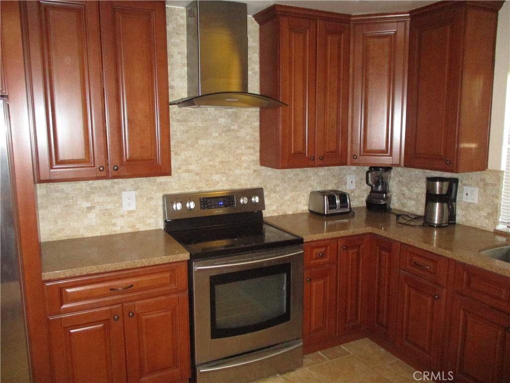 Fabulous upgrades on this unit over the years. You'll feel like you at a hotel! Beautiful Travertine flooring throughout, beautiful kitchen cabinets, stainless steel appliances, located on the "best" street in the Desert Princess! The "primary" bedroom has high ceilings and wonderful crown molding. The primary bath has lots of closet space, and a locked closet for the owner's use only. It also has double sinks, and an unbelievable Travertine shower with a wand and a rain shower head. Outside, you can enjoy the golfers driving by as you sip your morning coffee! The wellness center is just down the street, with all the machines you need to stay fit! There is also, Raquetball and even Massages that can be booked. Tennis and pickle ball courts are right outside! The golf registration is another minute down the road. The complex has 32 pools and spas. The golf course is a resort style with a 27 hole gorgeous golf course. The golf annex has a great restaurant, bar, and snack shop next to the starters golf shop. Desert Princess Hotel offers a great restaurant and a few bars. Just across the street is Starbucks, IHOP, and a huge Stater Brothers!. The just a short drive to downtown Palm Springs and 10 minutes to Rancho Mirage, Agua Caliente Casino, and Costco and Indian Wells a few minutes farther. For the price, this is the nicest 3 bedroom, 2 bath on the market. Remember, 55 years or older community