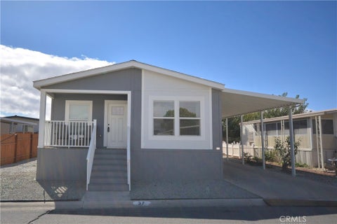 Photo of 13393 Mariposa Rd, #37 RD, Victorville, CA 92395 (MLS # HD26220074)