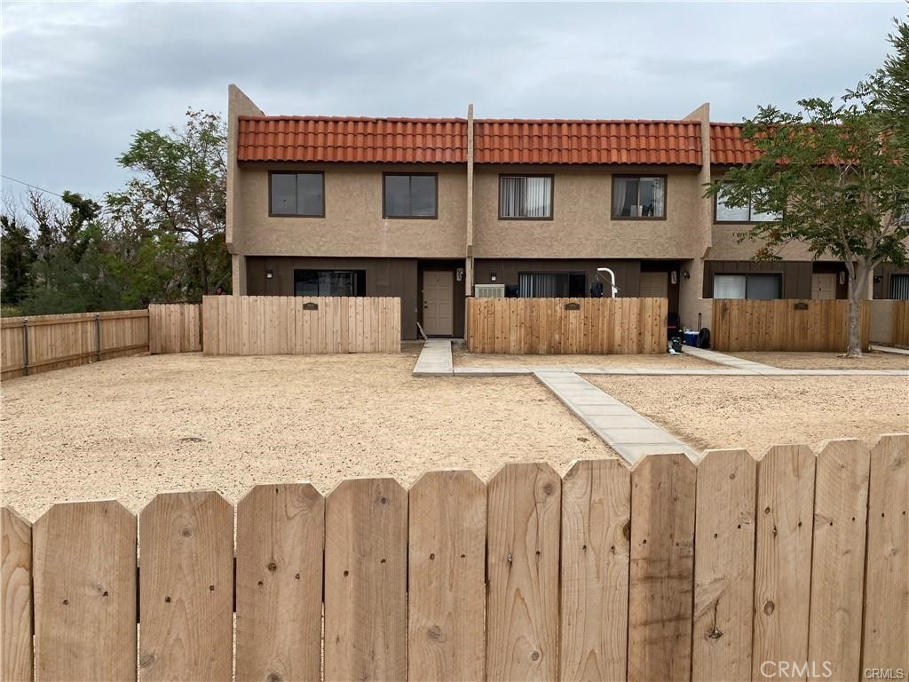 Location, location, location !3-Bedroom, 2.5-Bath Condo in Yucca Valley, Ready for You to Make Your Own! Needs some work! What a bargain! Spacious at 1701 square feet of living area. Downstairs: kitchen, living room, half bath, laundry, and patio. Upstairs – 3 bdrms & 2 baths. Very close to coffee shops, the downtown shopping area, and near Palm Springs and Joshua Tree National Park! The property features two parking spaces (1 covered, one uncovered), with Wood fencing surrounding the entire north side of the complex. Each unit has its patio fenced in with wood (no gate), and the HOA prohibits dogs on the Property Due to the Proximity to the City Sewer.
Live in or Rent! Great Views. Clear skies & starlit nights. Located close to Old Town, within walking distance to New Frontier Coffee, a laundry room is situated inside, under the stairs, with ample storage space.
This 3-bedroom, 2.5-bath condo in Yucca Valley is ready for you to make it your own! It needs some work!
**Property Details:**
- **Downstairs:** Kitchen, living room, half bath, laundry room, and patio.
- **Upstairs:** 3 bedrooms and 2 bathrooms.
The condo is conveniently located near coffee shops, the downtown shopping area, and is close to Palm Springs and Joshua Tree National Park!!
This condo is ideal for both living in and renting out.
This is an excellent opportunity for first-time buyers or investors. Call to schedule a viewing today! This makes for a great 1st time buyer or investor. Call, take a look, see!